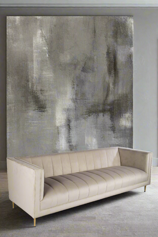 modern gray upholstered sofa with gold legs