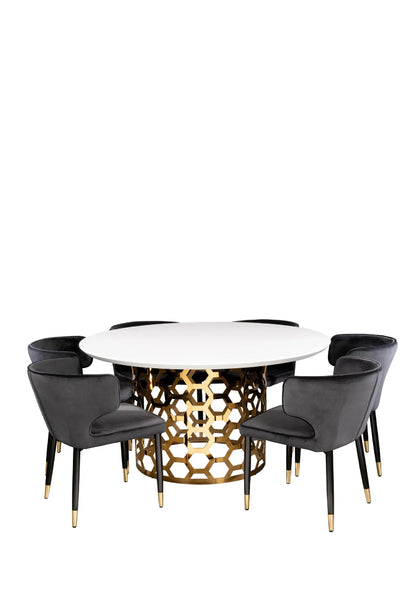 white and gold round dining table set with black chairs