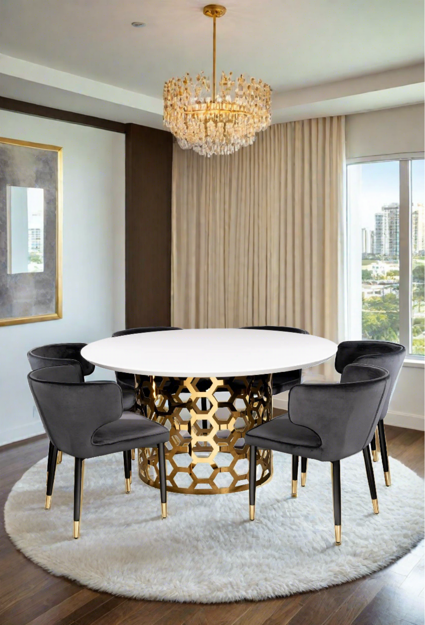 white and gold round dining table with black chairs